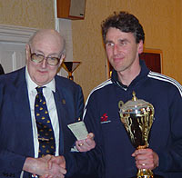 2003 Monarch Assurance winner Simen Agdestein receives the trophy from Patrick Taylor of the sponsors Monarch Assurance